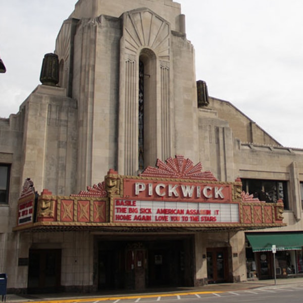 Large Historic Building with Theather Sign on the Front for "PickWick"